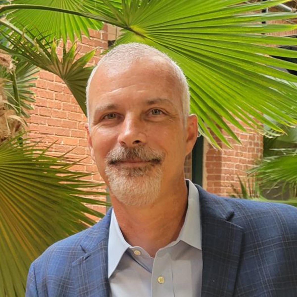 Travis Waters, President & CEO